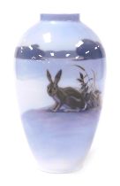 A Royal Copenhagen porcelain vase, of shouldered ovoid form, decorated with a hare in a Winter lands