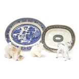 Three Lomonosov porcelain figures of animals, comprising a recumbent elephant, polar bear, and a don