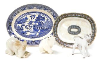 Three Lomonosov porcelain figures of animals, comprising a recumbent elephant, polar bear, and a don