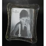 A Waterford Crystal strut photograph frame, etch marked and bears paper label, boxed, aperture 25cm