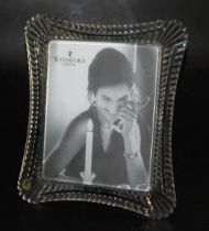 A Waterford Crystal strut photograph frame, etch marked and bears paper label, boxed, aperture 25cm