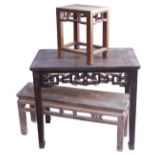 A Chinese elm side table, with a carved frieze, raised on square legs, 87cm high, 99cm wide, 58cm de