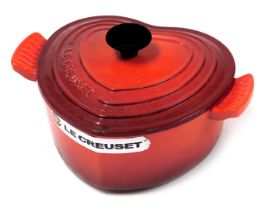 A Le Creuset red enamelled cast iron casserole dish, 1.9L, boxed.