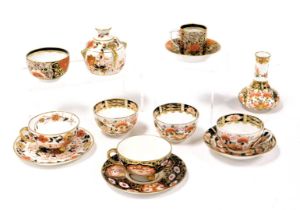 A group of Derby Stevenson and Hancock porcelain Imari tea and coffee wares, together with a spill v