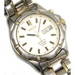 A Seiko gentlemans kinetic titanium 100mts stainless steel cased wristwatch, boxed with instructions