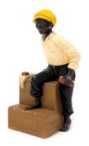 A French advertising ceramic of a shoe shine boy. Marked Cireur to front. Approx 22cm high