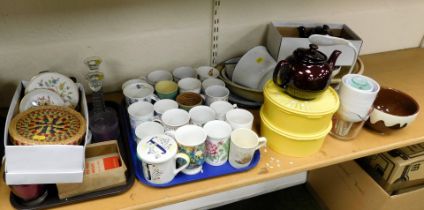 A tray of treen or wooden wares, including assorted bowls, cut glass candlesticks, quantity of mugs,