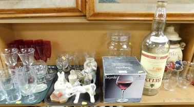 Assorted glassware and ceramics, including red glass drinking glasses, champagne flutes, pint glasse