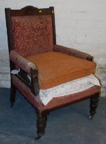 A Victorian mahogany and upholstered parlour chair.