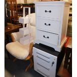 Two chests of three drawers, a small three box kitchen unit, and a chair upholstered in light brown