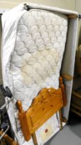 A single mattress, a pine single headboard, and a base unit. Lots 1501 to 1590 are available to vie