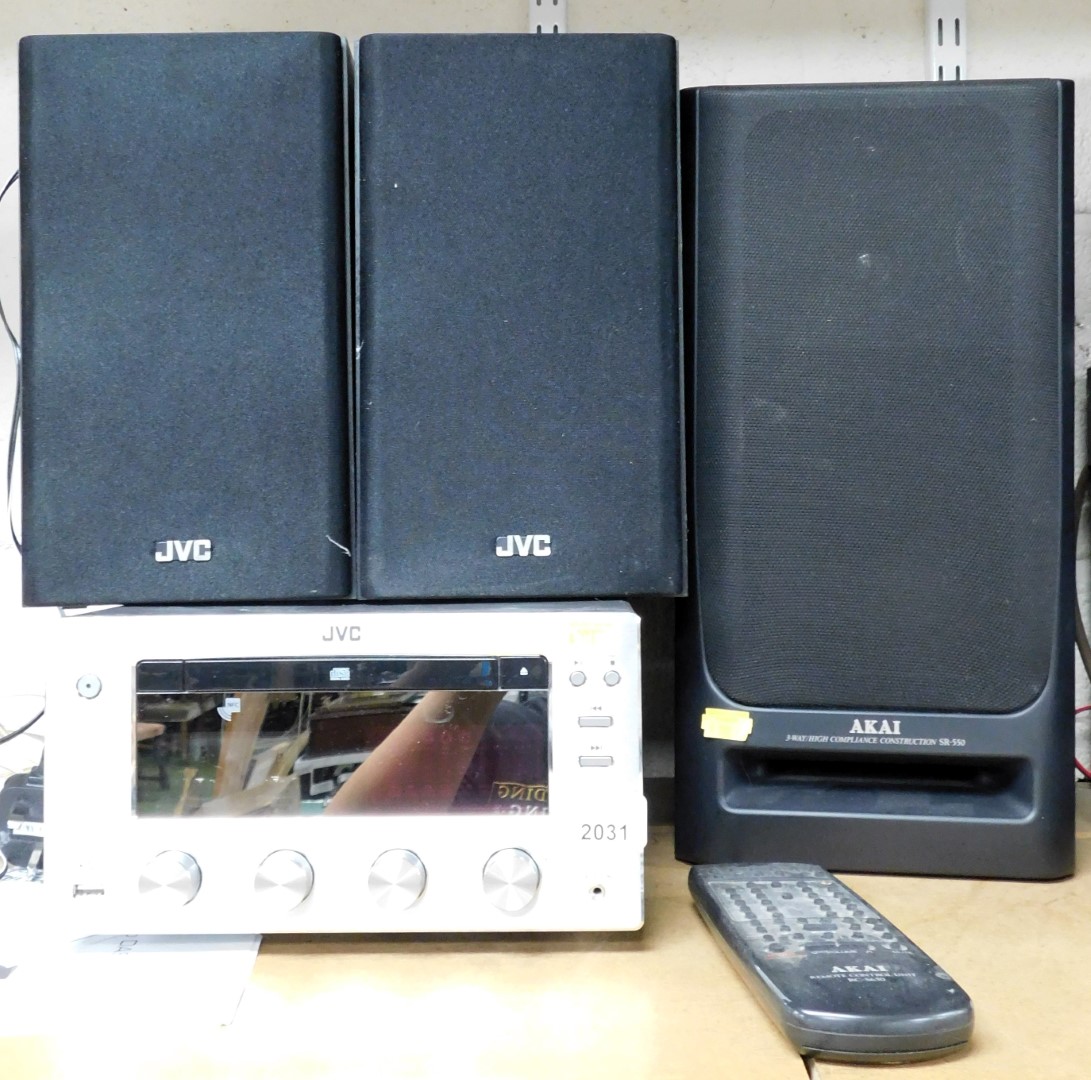 A JVC compact disc player, with speakers.