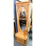 A dressing mirror, in frame above single drawer, raised on bracket base, approx 6ft high. Lots 1501