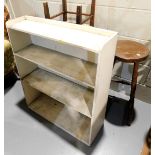 A drop leaf gate leg dining table, a small white painted open bookcase, small stool with rush seat,
