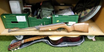 Miscellaneous , items to include an air rifle, dartboard, a guitar and metalwares, etc. (3 boxes +)