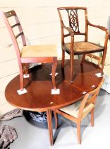 A dining table, extendable, with six chairs, and a stereo unit with turntable. Lots 1501 to 1590 are