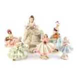 A group of Continental porcelain crinoline figures, to include Dresden, the largest 16cm high.