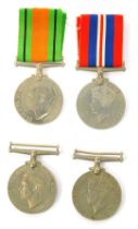 Four World War Two medals, comprising three 1939-45 War medals and a Defence medal, two with ribbons