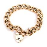 A rose gold charm bracelet, links of hammered design, with safety chain and heart shaped padlock, ma