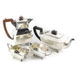 An Art Deco electroplated four piece tea set, comprising teapot, hot water jug, two handled sugar bo