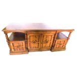 A Victorian burr elm Aesthetic movement sideboard, the rectangular top with a moulded edge, above a
