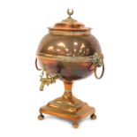 A Victorian copper and brass tea urn, with crescent moon shaped finial and lion mask ring handles, 5