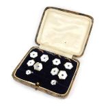 A gentleman's collar stud set, comprising pair of cufflinks, two collar studs, and four pins, each w