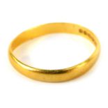 A 22ct gold wedding band, of plain design, ring size O, 2.1g all in, misshapen.