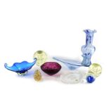 A group of coloured glass ware, to include bowls, paperweights, a Waterford Crystal trinket dish, bo