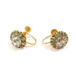 A pair of cluster earrings, each set with imitation diamonds, in a claw setting, in yellow metal fra