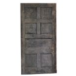 A pine stained hall door, from Ketton Hall, Nr Stamford, with three sectional wood design, with appl