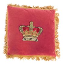 A 20thC red velvet cushion, with central embroidered crown motif, surrounded by gold coloured fringi