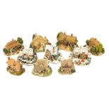 A group of Lilliput Lane cottages, to include The Pottery, The Christmas Present, Christmas Party, T