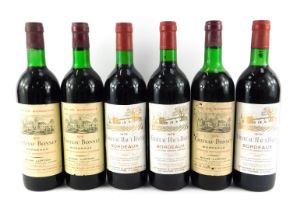 Three bottles of Chateau Haut-Bayle 1976 wine, together with three bottles of Chateau Bonnet 1976 re