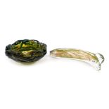 A Mdina glass ashtray or bowl, of circular form with a waved edge, decorated with flashes of green,
