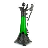 A WMF Art Nouveau pewter and green glass ewer and stopper, decorated with flowers and two maidens, s