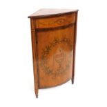 An Edwardian Neo Classical revival Edwards and Roberts mahogany and inlaid bow fronted corner cupboa