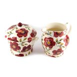 An Emma Bridgewater pottery 6 pint jug, decorated in the Christmas Rose pattern, second quality, 23c