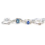 Four Gems TV dress rings, each stone set, two with light blue stones, the other with CZ and imitatio