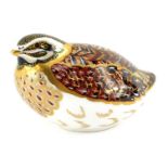 A Royal Crown Derby porcelain paperweight, modelled as a dappled quail, gold stopper, red printed ma