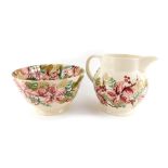 An Emma Bridgewater pottery 3 pint jug decorated in the Christmas Lily pattern, 18cm high, together