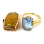 Two items of jewellery, comprising an 18ct gold aquamarine dress ring, the oval aquamarine in four c