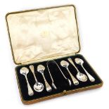 A set of six Victorian Old English pattern teaspoons, together with a pair of sugar nips, each bowl