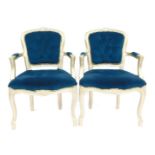 A pair of turquoise salon chairs, each with a buttoned border on silver painted frame, 90cm high, 58