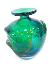 A Mdina 'Pulled Ear' glass vase, in green decorated with flashes of yellow and blue, 14cm high.