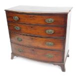 A 19thC mahogany bow front, chest of four long drawers, with brass lion mask handles, on bracket fee