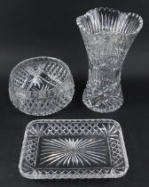 Three items of cut glassware, comprising bowl, 23cm diameter, rectangular tray, 29cm wide, and vase