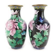 A pair of Japanese cloisonne vases, each of cylindrical tapering form, with flared neck, decorated w