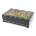 A mid century Russian lacquered box, decorated with a scene depicting figures and dog, within woodla