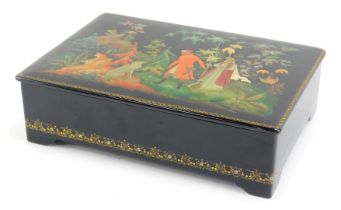 A mid century Russian lacquered box, decorated with a scene depicting figures and dog, within woodla